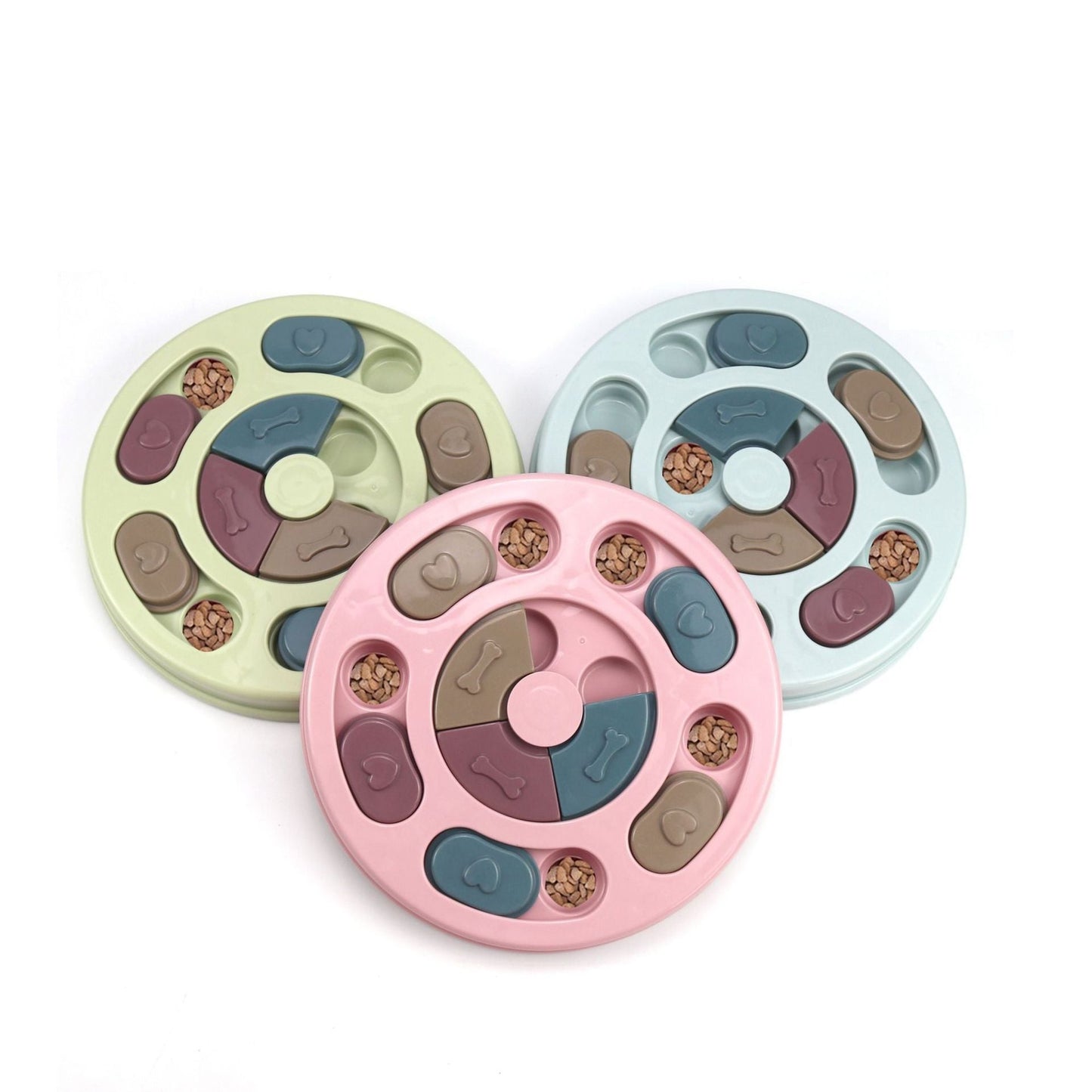 Circular rotating disc puzzle feeder in pastel colors for dog cat enrichment