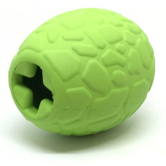 Close-up of lime green reptile scale texture on rubber toy