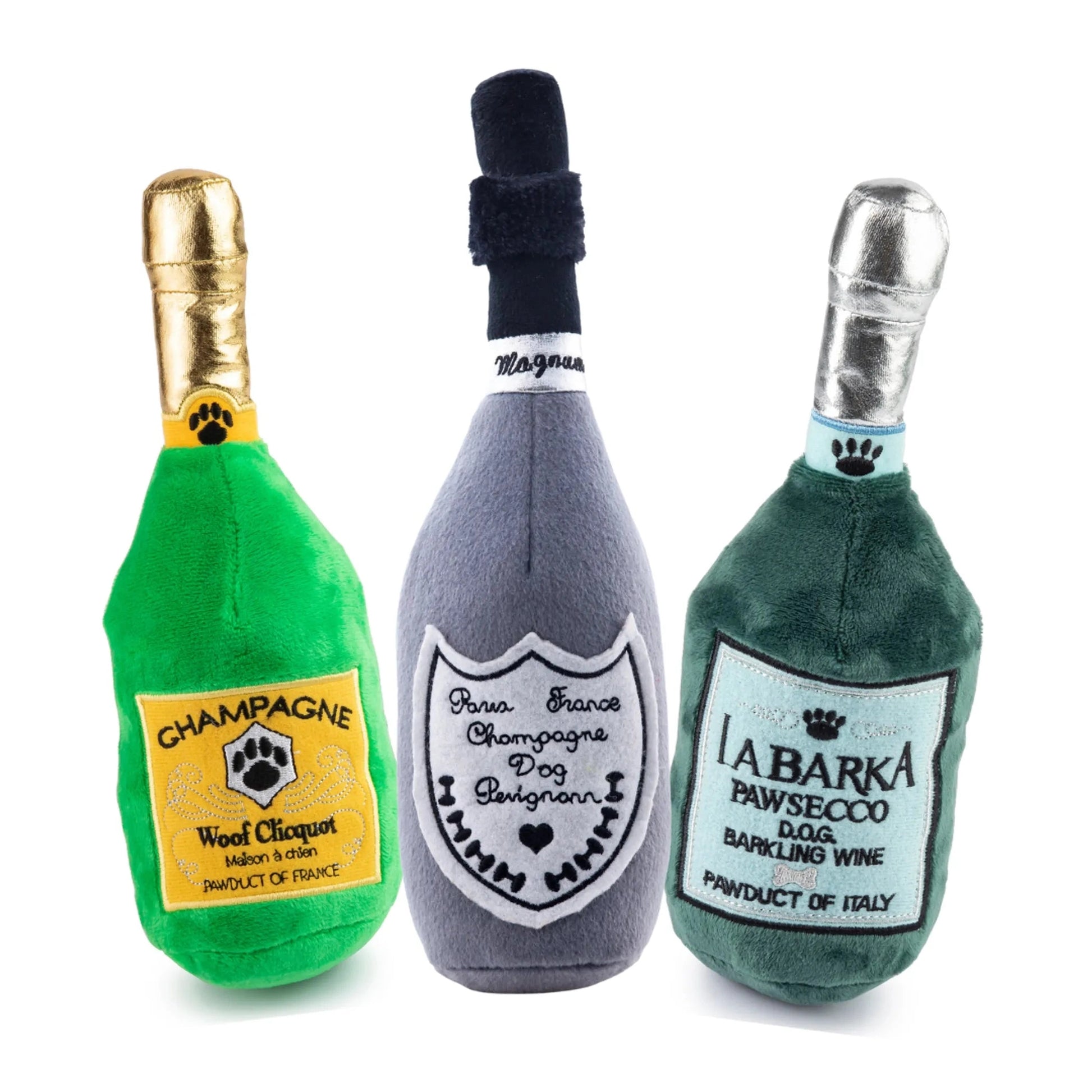 Three plush champagne bottle dog squeaker toys in green, gray, and dark green with foil necks