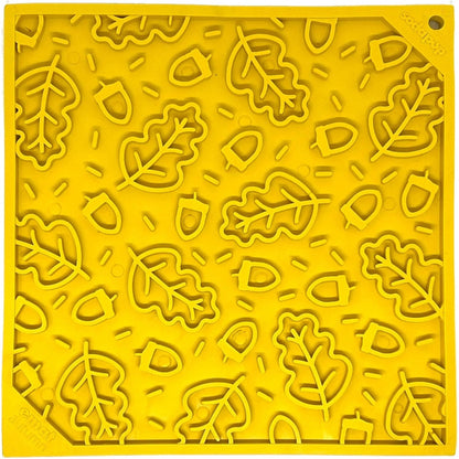 Top view of bright yellow SodaPup eMat autumn leaf pattern with raised contours