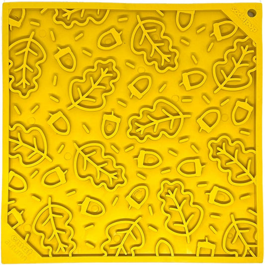 Top view of bright yellow SodaPup eMat autumn leaf pattern with raised contours