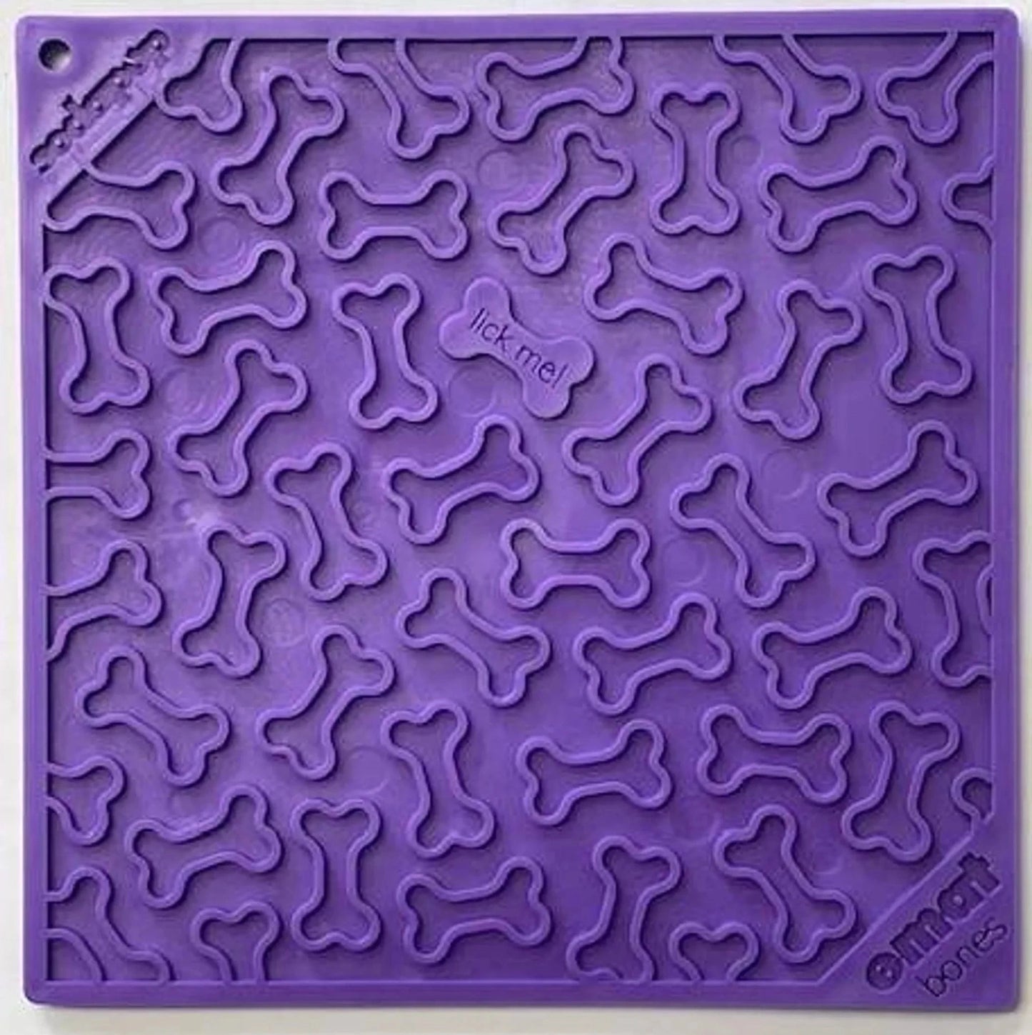 Purple SodaPup eMat bones silicone lick mat with textured surface