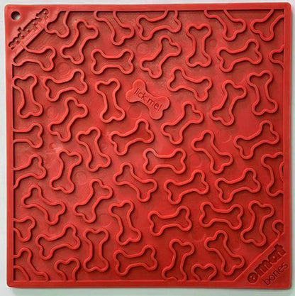 Red SodaPup Bones Design silicone lick mat with raised bone pattern