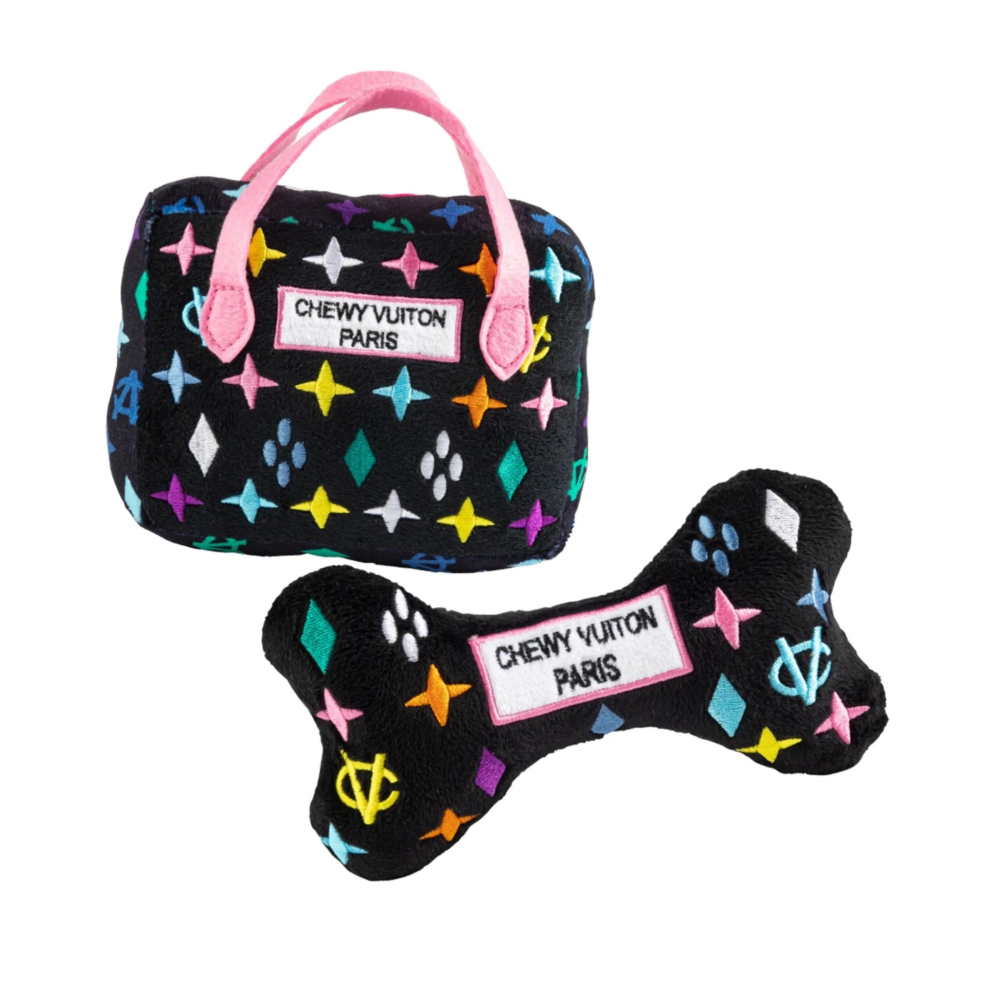 Chewy Vuiton Bundle squeaker plush toy with handbag and bone featuring pink handles and geometric patterns