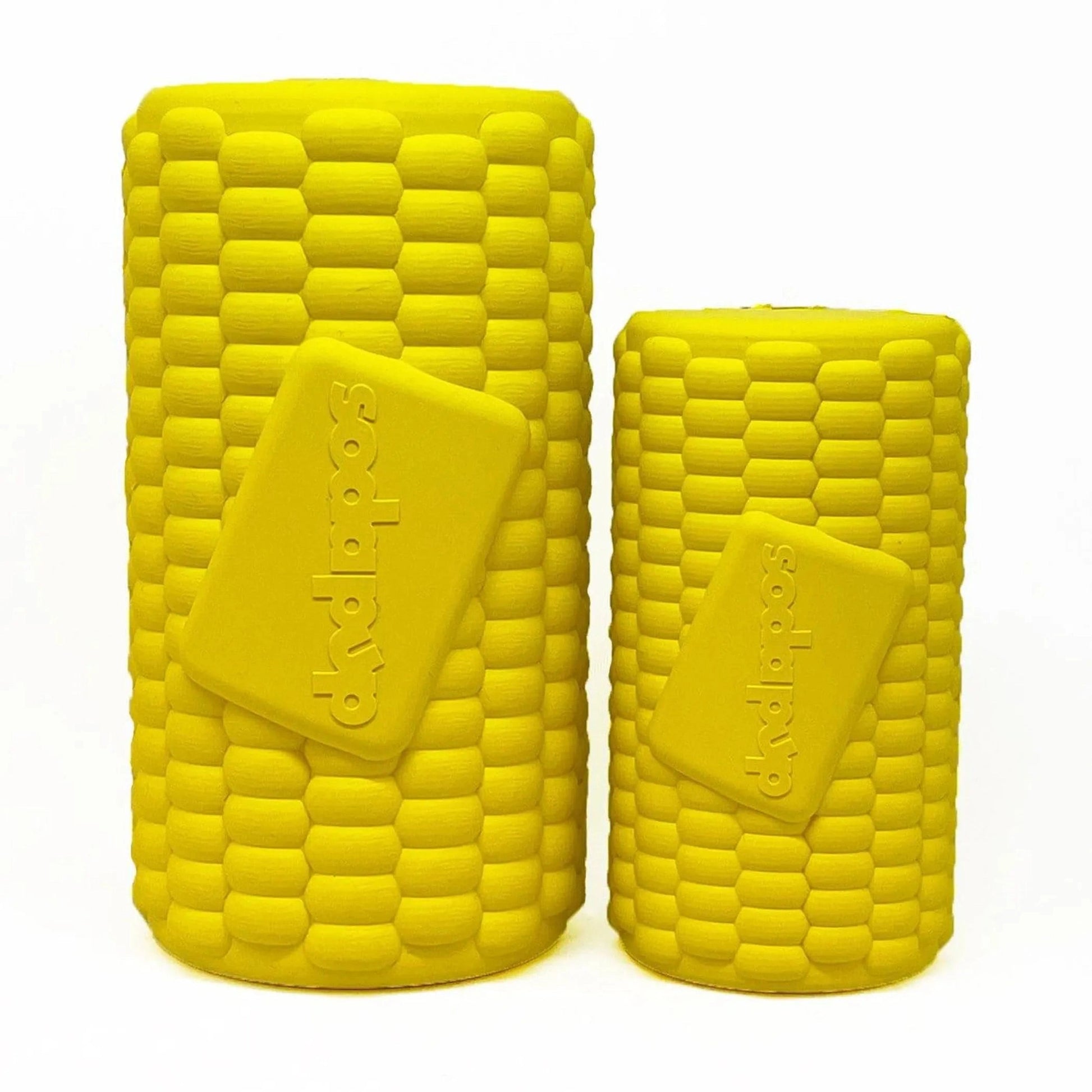 Medium and large yellow corn cob rubber dog toys side by side showing size options