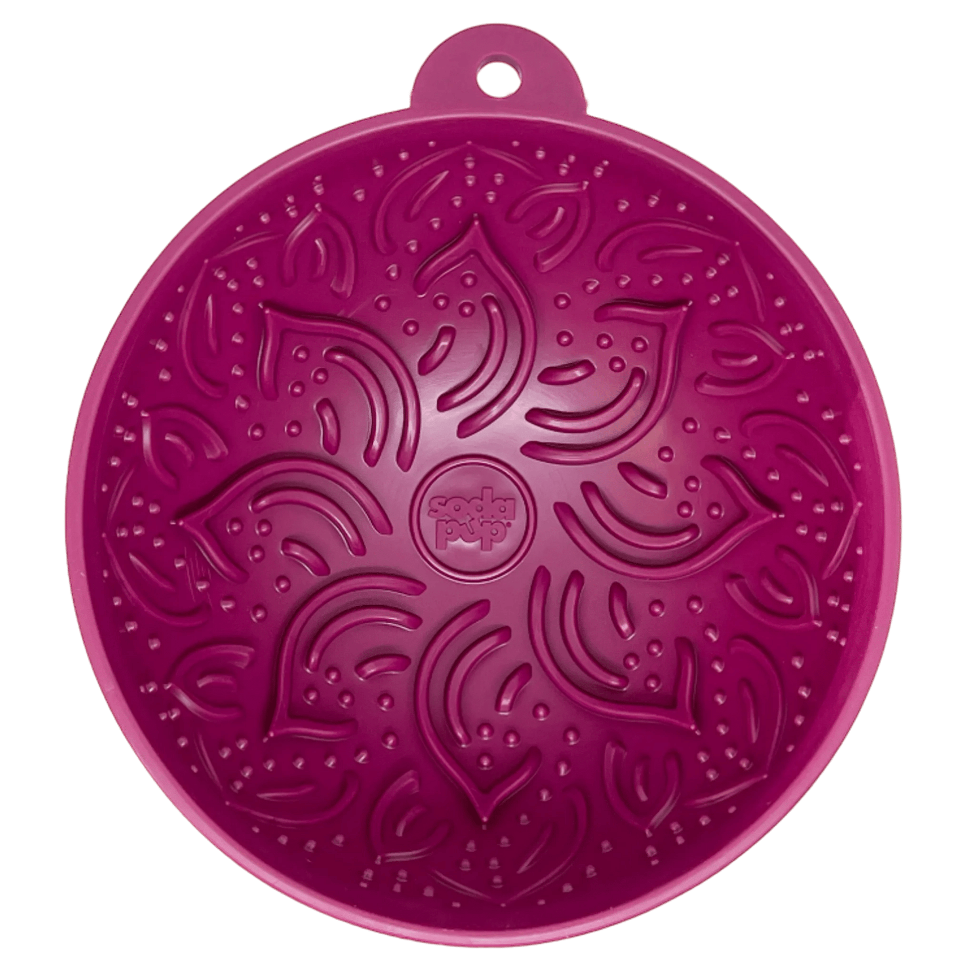 Magenta circular silicone lick mat featuring embossed leaf patterns and central logo