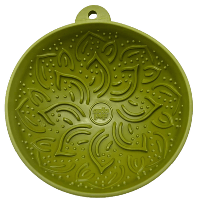 Olive green Silicone wobble lick mat with textured garden design for dog enrichment