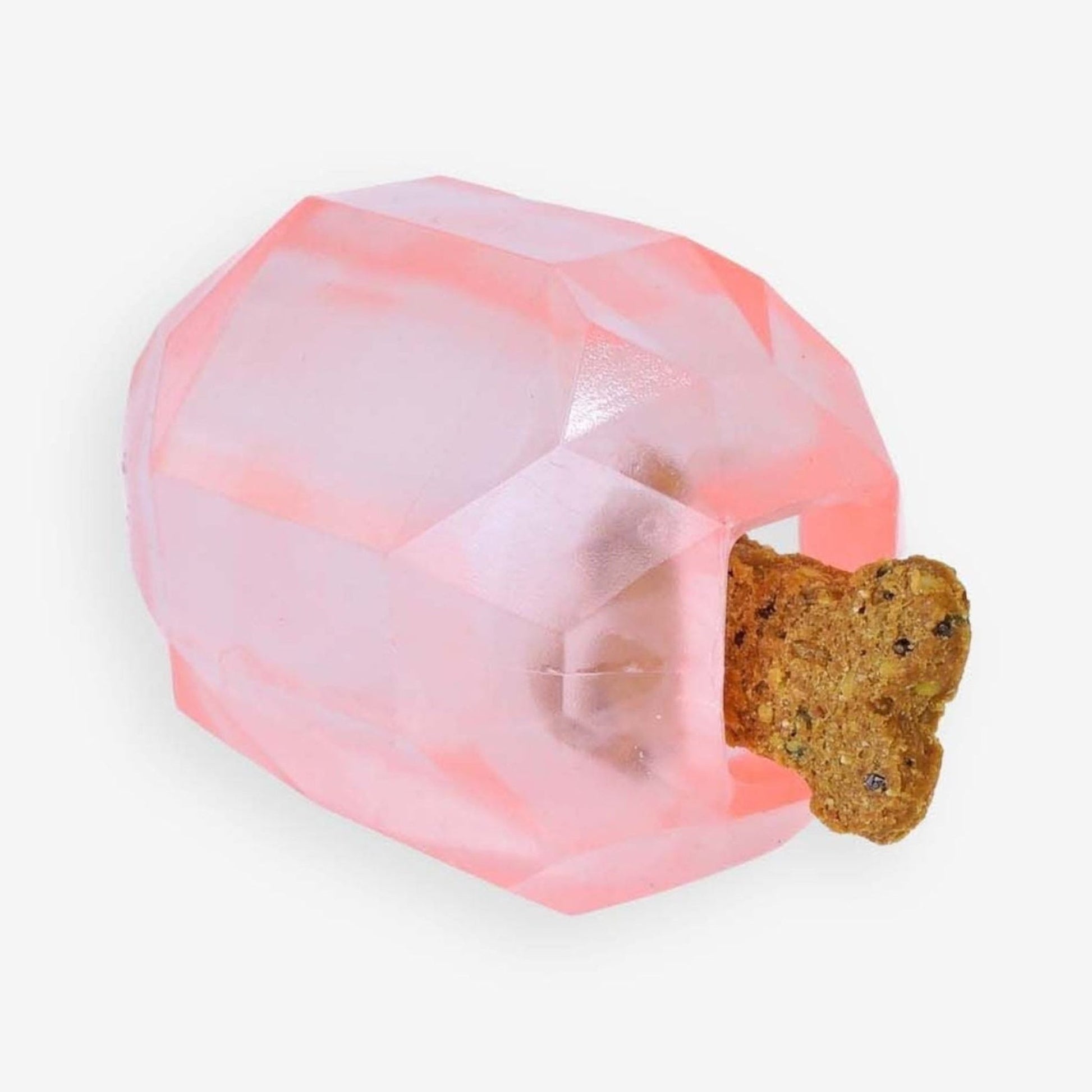 Translucent pink pet puzzle feeder with bone-shaped kibble insert