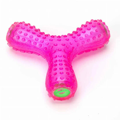 Pink translucent rubber bone dog toy with textured bumps for mental enrichment