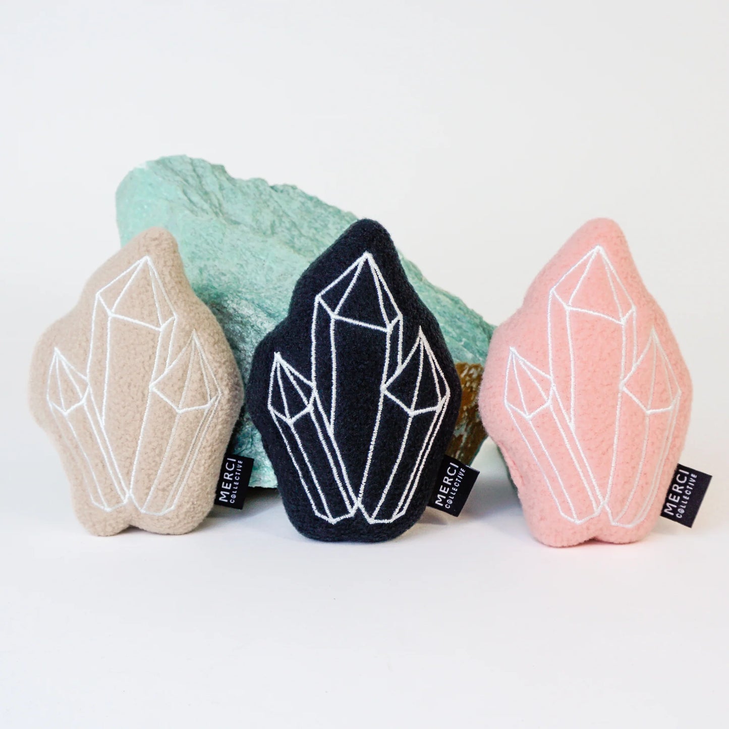 Multi-color crystal cluster cat toys in beige navy and pink with catnip enrichment