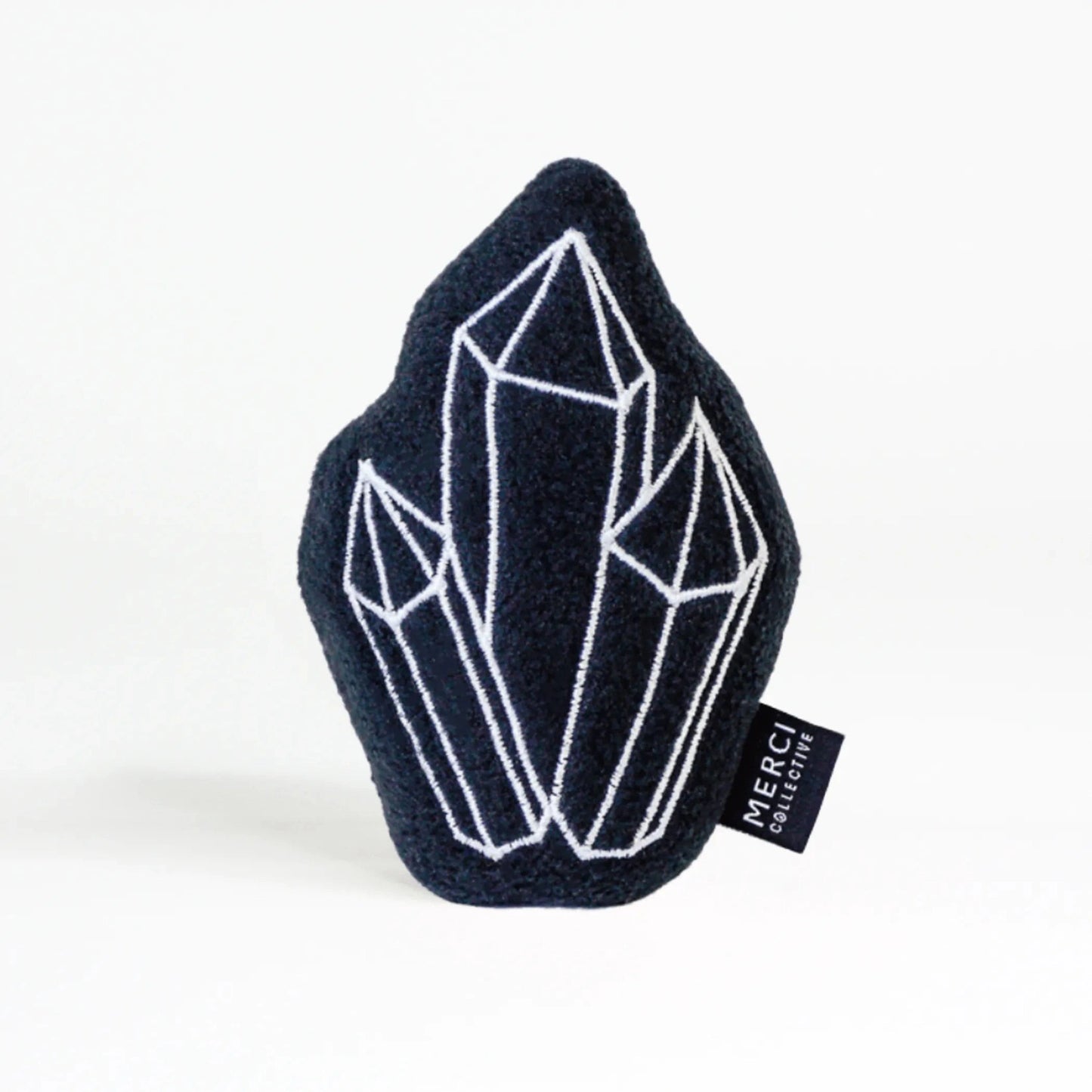 Navy blue plush crystal cat toy with embroidered details and Merci Collective tag
