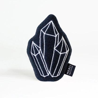 Navy blue plush crystal cat toy with embroidered details and Merci Collective tag
