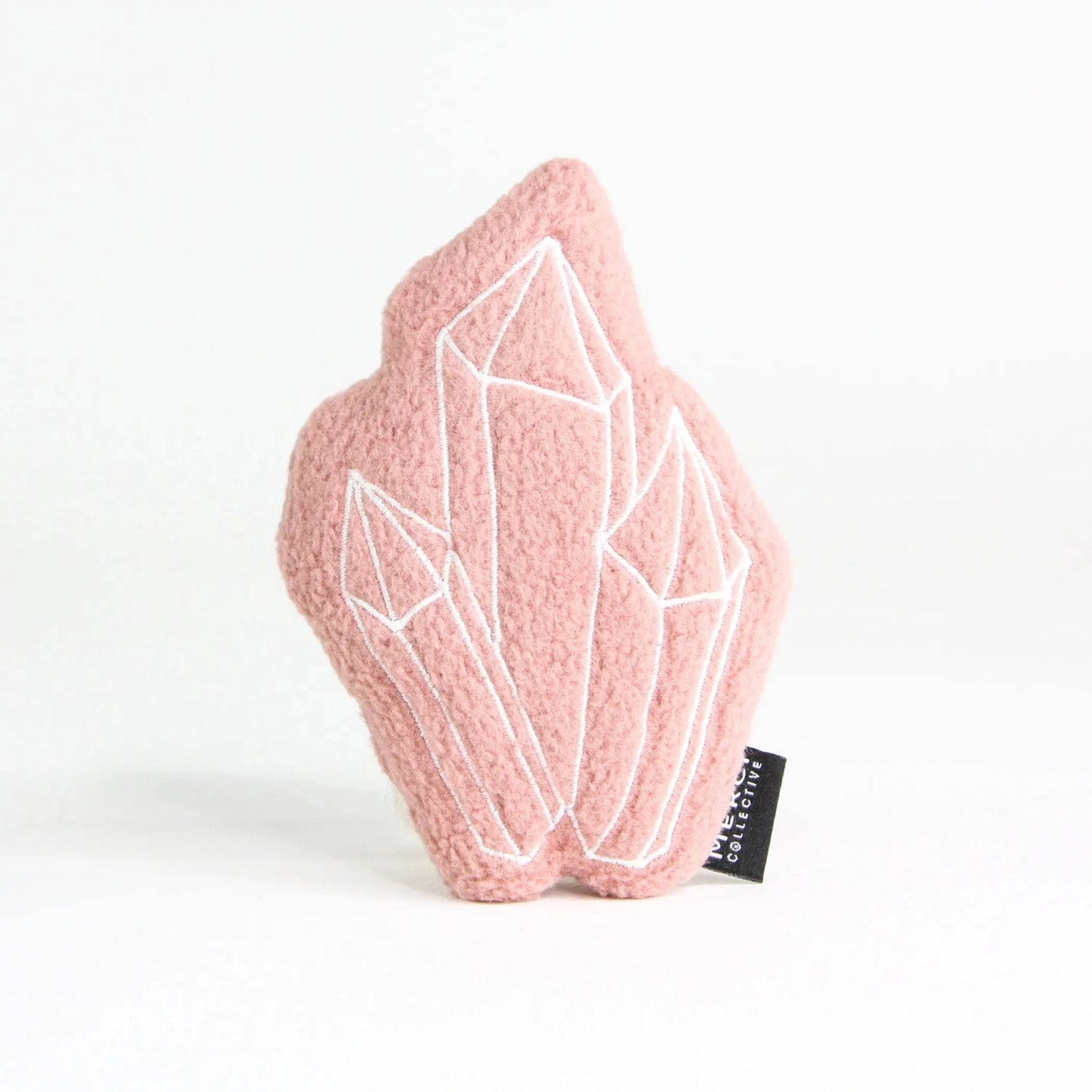 Pink plush crystal shaped cat toy with white embroidery and soft textured fabric