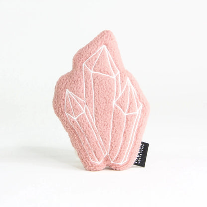 Pink plush crystal shaped cat toy with white embroidery and soft textured fabric