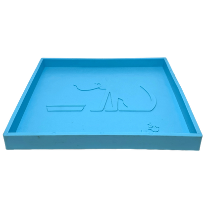 Top view of light blue matte suction cup holder with embossed dog and bowl design