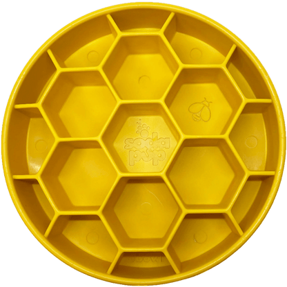 Yellow SodaPup hexagonal slow feeder bowl top view with embossed bee logo