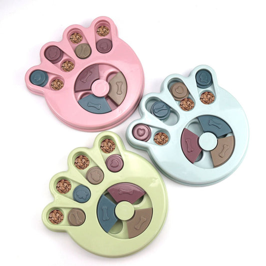 Pastel pink blue green paw-shaped slider puzzle feeder for dogs and cats
