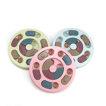 Circular rotating disc puzzle feeder in pastel colors for dog cat enrichment
