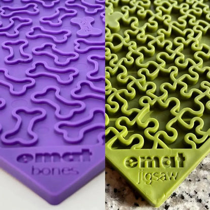 Close-up of textured purple bone and green jigsaw eMat surfaces