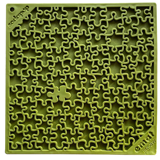 Bright pink jigsaw puzzle design lick mat close up