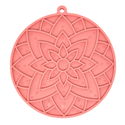 Coral pink SodaPup Lotus silicone lick mat with suction cups for slow feeding and grooming