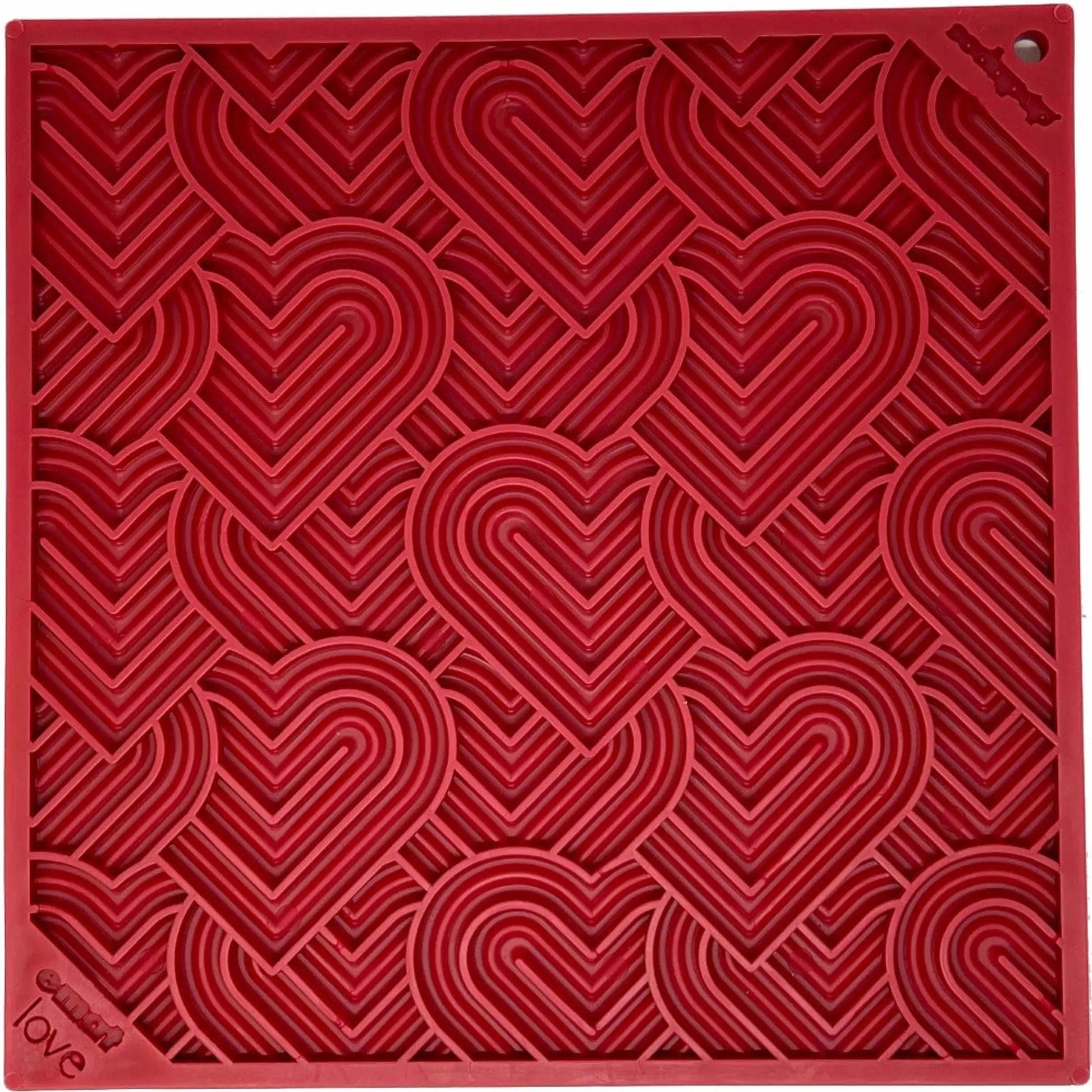 Top view of red square SodaPup love eMat with concentric heart grid texture