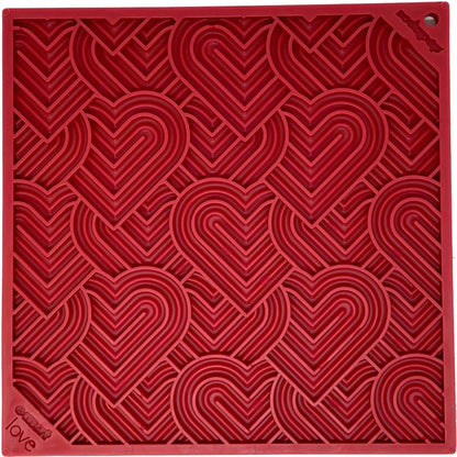 Top view of red square SodaPup love eMat with concentric heart grid texture