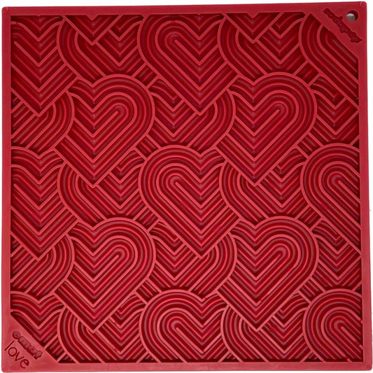 Top view of red square SodaPup love eMat with concentric heart grid texture