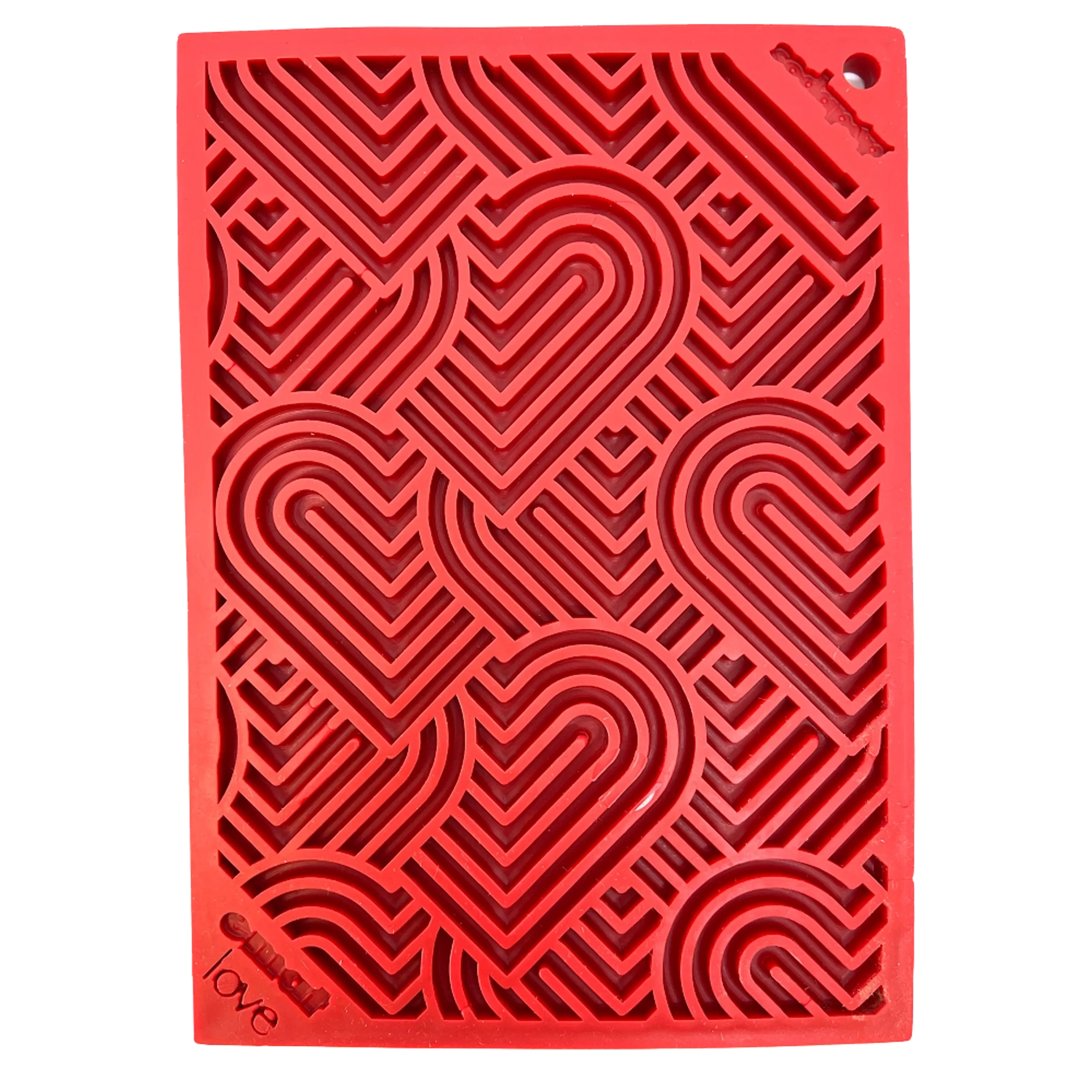 Close-up of red SodaPup heart pattern enrichment feeder maze channels