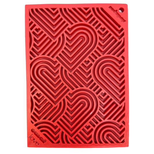 Top view of red square SodaPup love eMat with concentric heart grid texture