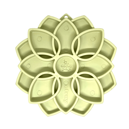 Light green flower-shaped SodaPup eTray mandala slow feeder with textured compartments