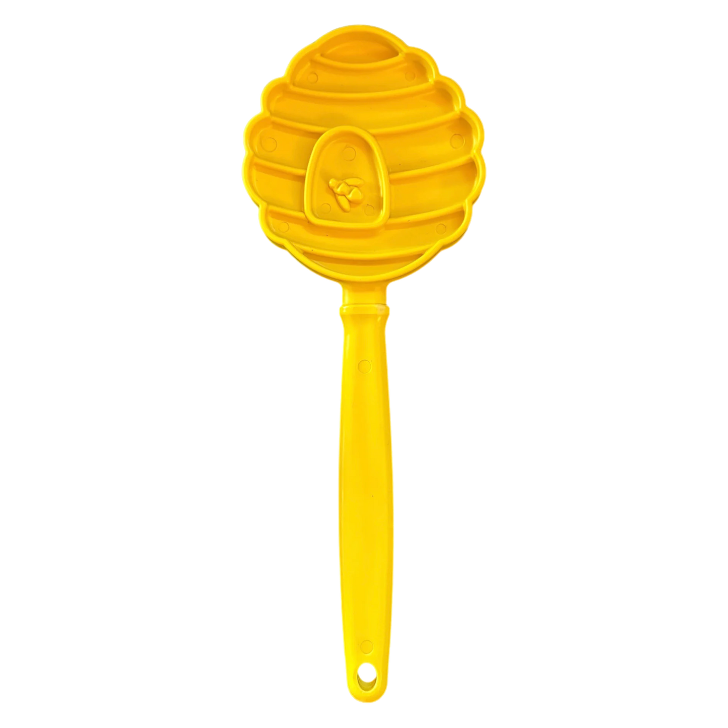 Yellow beehive shaped SodaPup lick stick with raised bee emblem and textured grooves