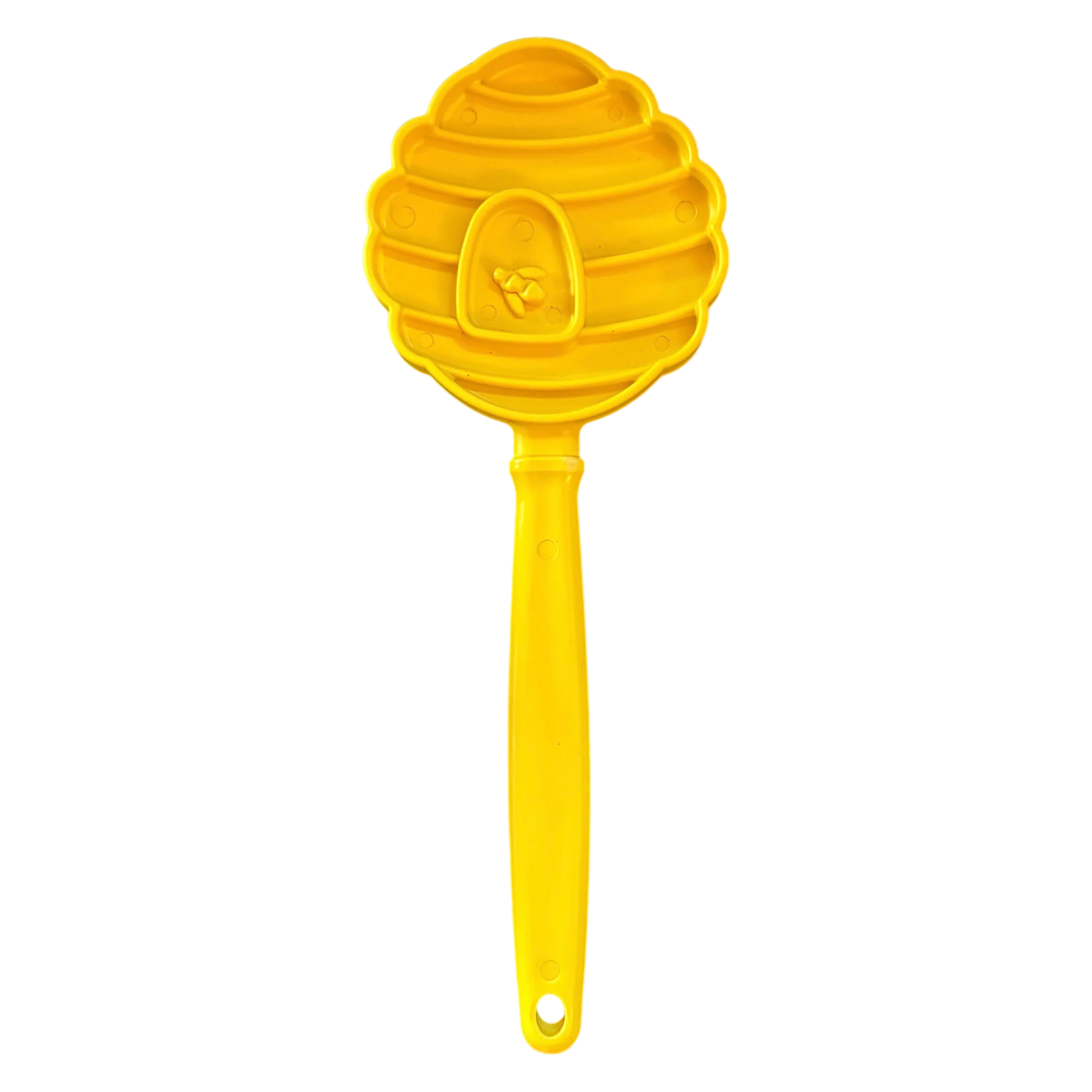 Yellow beehive shaped SodaPup lick stick with raised bee emblem and textured grooves