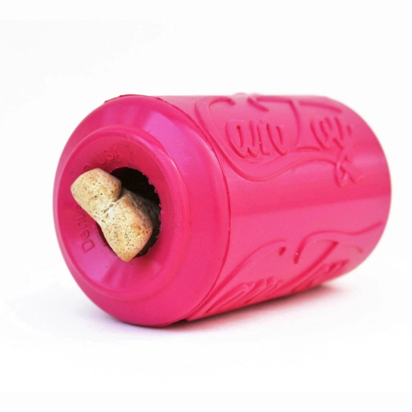 Pink treat dispenser toy with dog treat inside