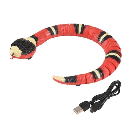 C-shaped red segmented snake toy with USB-A and micro-USB connectors