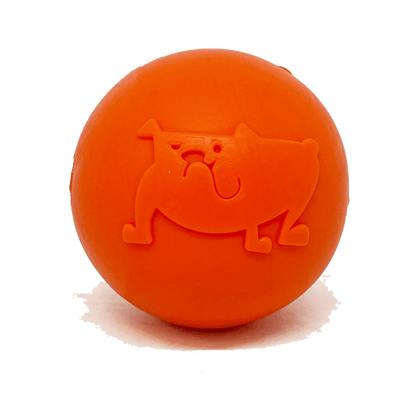 Orange embossed dog face rubber chew ball on white background