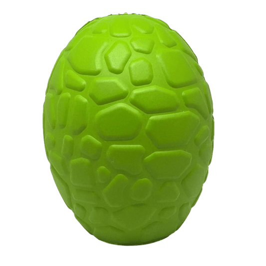 Close-up of lime green reptile scale texture on rubber toy