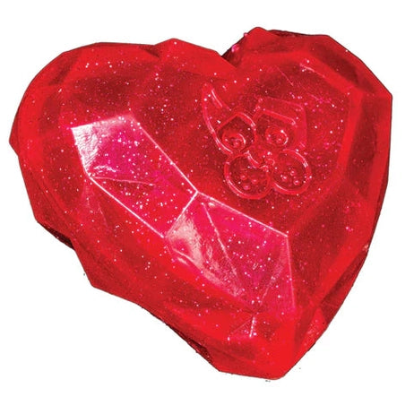 Red heart-shaped translucent plastic squeaky dog toy with internal glitter