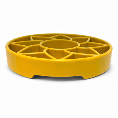 Side view of shallow yellow sunflower dog slow feeder with stability feet