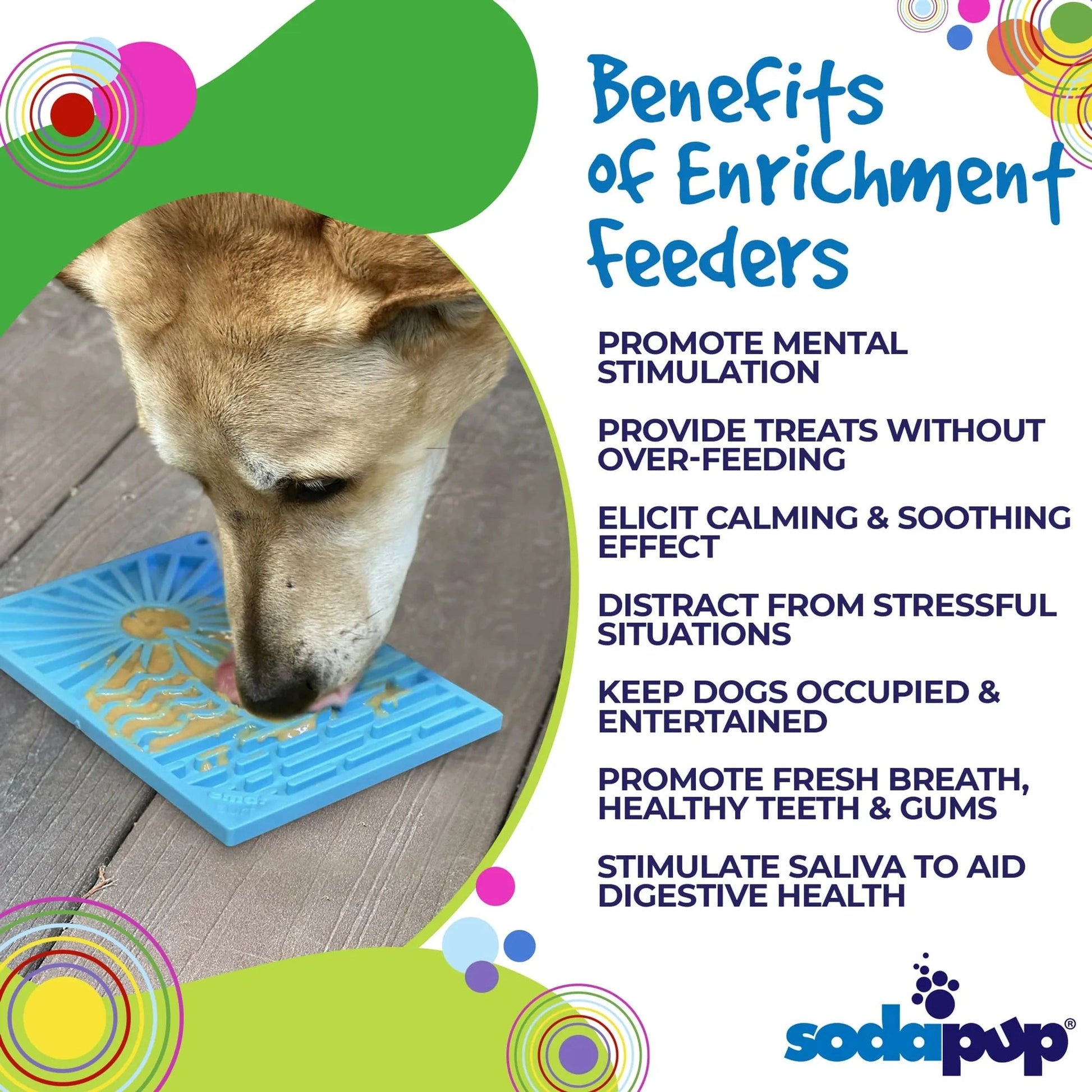 Tan dog using blue surf-themed lick mat on wooden deck outdoors