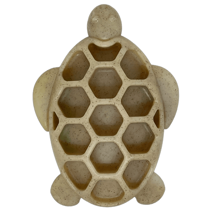 Empty beige speckled nylon turtle puzzle feeder with hexagonal treat compartments