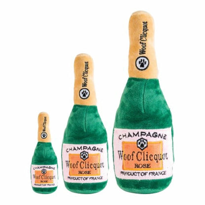 Set of three green Woof Clicquot Rosé champagne bottle plush dog toys