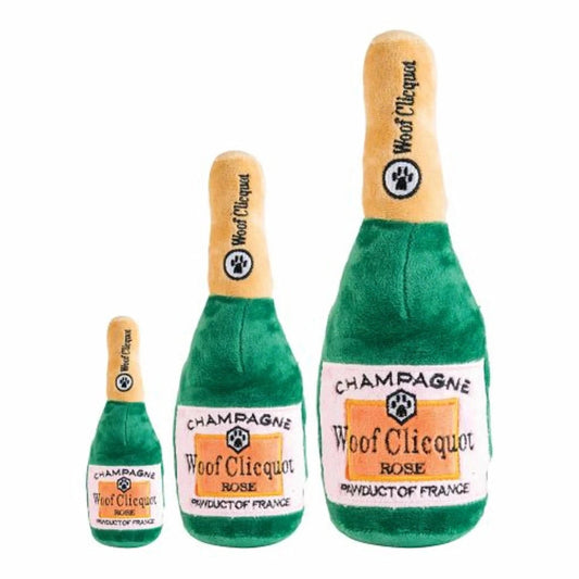 Green Woof Clicquot Rosé plush dog toy with pink label and squeaker