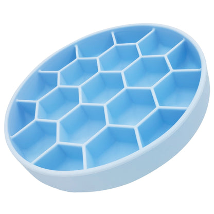 Light blue silicone slow feeder dog bowl showing honeycomb pattern and matte finish detail
